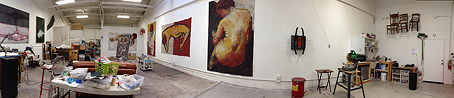 The studio of  Barbara Downs with large-scale figurative paintings and other artwork