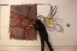 Barbara Downs working on a large painting in her studio