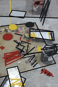 Barbara Downs' studio floor with a mess of painting supplies, with drawing overlay