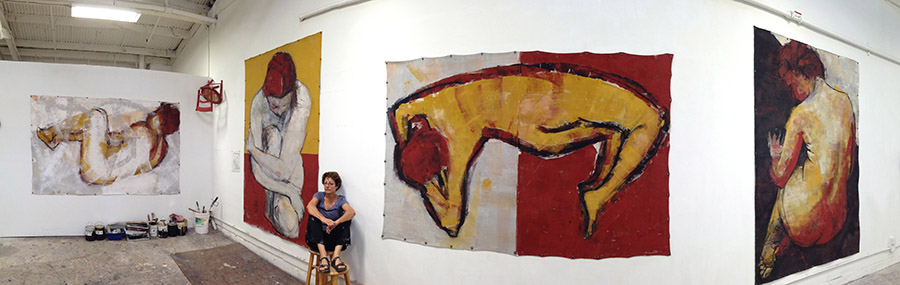  Barbara Downs in her studio with large-scale figurative paintings